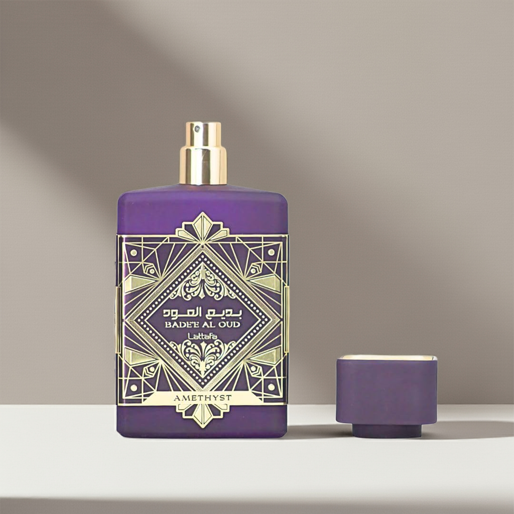 Bade'e Al Oud Amethyst – Bold, Luxurious & Elegant spray bottle with cap removed, showcasing the opulent gold nozzle and intricate design.