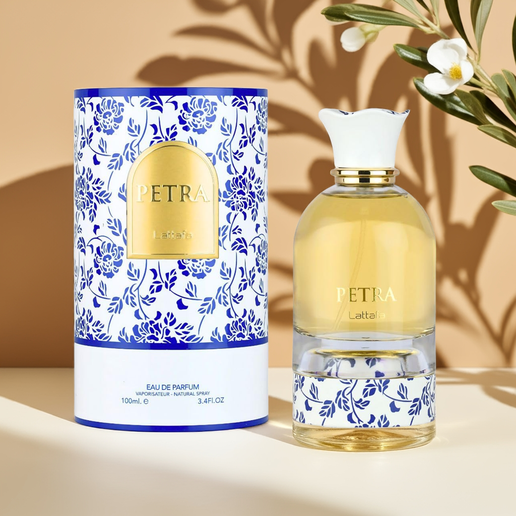 Lattafa Petra Eau de Parfum for Women with matching floral box, showcasing a luxurious Mediterranean-inspired scent with plum and praline notes.
