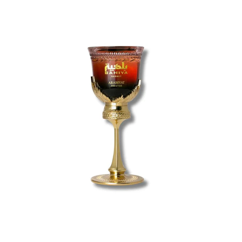 Close-up of Arabiyat Prestige La Di Da perfume glass on gold stand