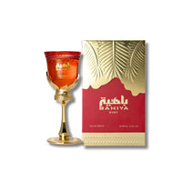 Bahiya Ruby perfume bottle with gold and red design, luxury fragrance for women