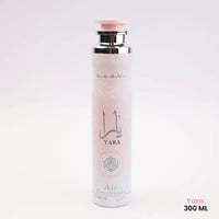 Lattafa Yara Air Freshener 300ml in a sleek pink and silver spray can with Arabic calligraphy, ideal for floral, fruity, and musky home fragrance.