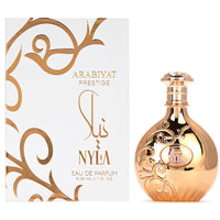 Arabiyat Prestige Nyla Eau de Parfum 2.7 fl.oz displayed with elegant gold-accented packaging, ideal for women seeking a soft, elegant scent.