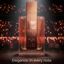 Lattafa Angham perfume bottle with elegant pink and gold design